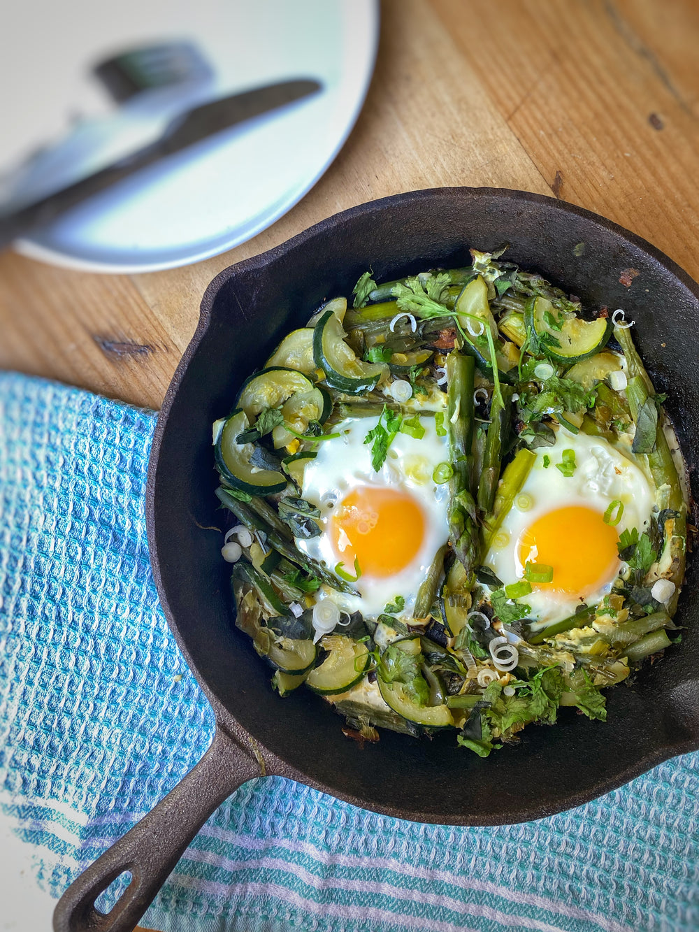 Herby Shakshuka with Asparagus and and Courgette